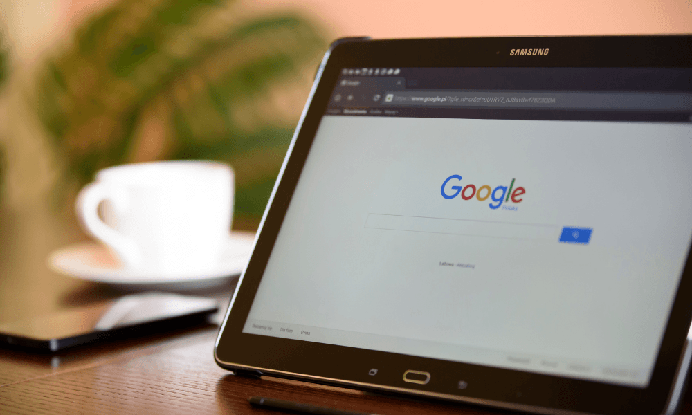Tablet showing the Google search page, representing online search and search engine optimization.